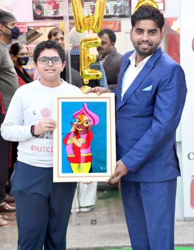 A Little boy, who is also a foodie like our regular customers is fascinated by our Services and chemical-free food and transparent in the kitchen with his extraordinary skill of drawing he made a very colorful painting of Pandeyji Cartoon.